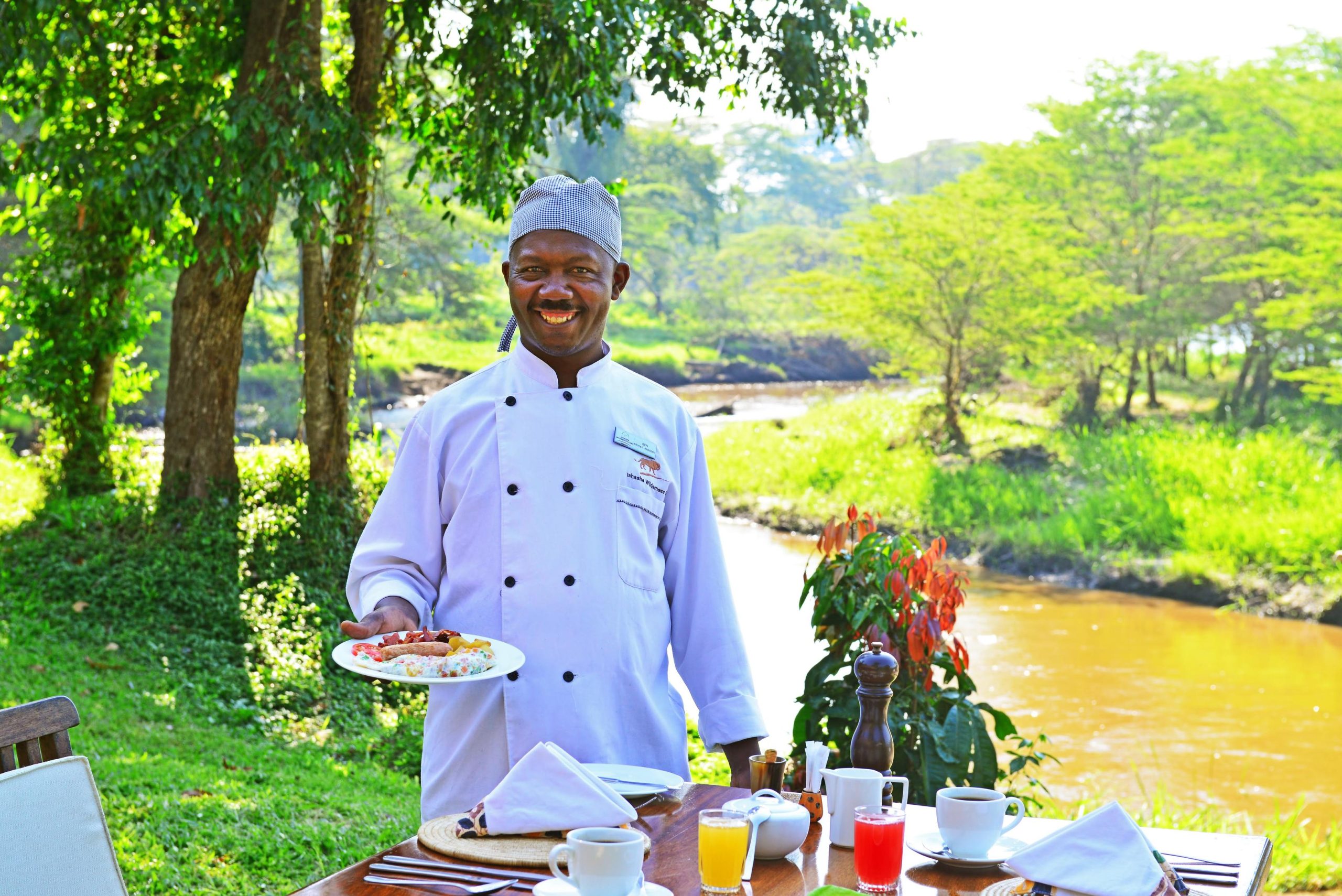 Ishasha Wilderness Camp riverside dining